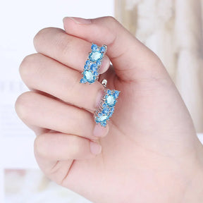 Brincos Sparkle Blue – Zircônia Azul em Prata 925