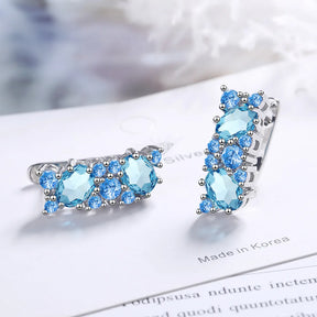 Brincos Sparkle Blue – Zircônia Azul em Prata 925