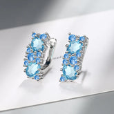 Brincos Sparkle Blue – Zircônia Azul em Prata 925