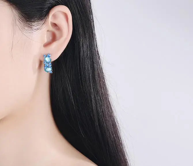 Brincos Sparkle Blue – Zircônia Azul em Prata 925